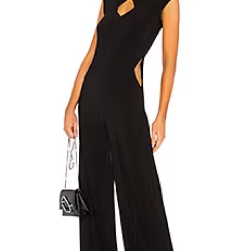Norma Kamani jumpsuit: Sleeveless, slim fit, with back zip fastening 🦋